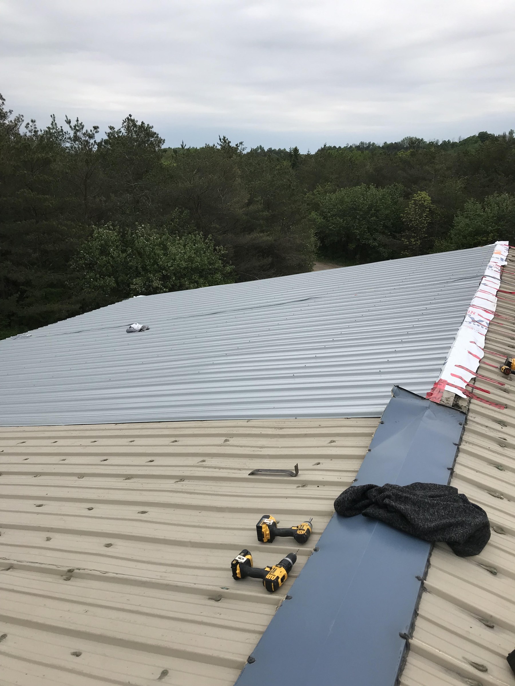 Hockley shop during — installing exposed-fastener panels