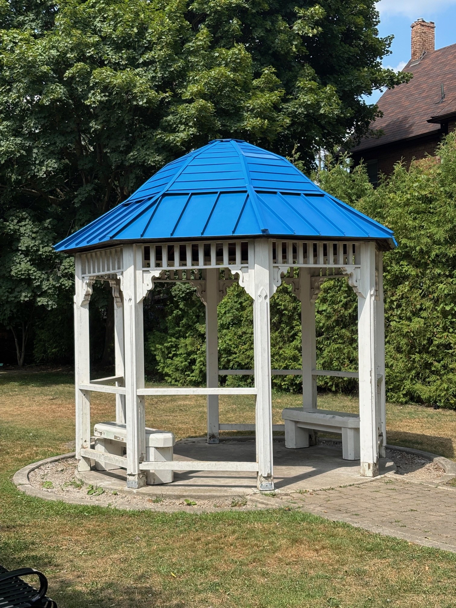 Gazebo after — cobalt blue standing seam complete