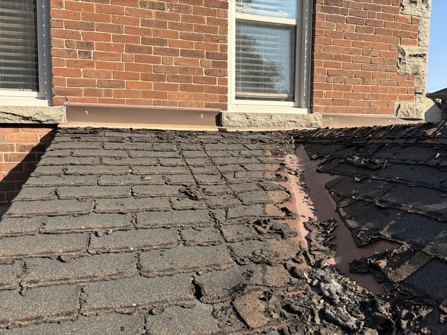Failed shingles before replacement